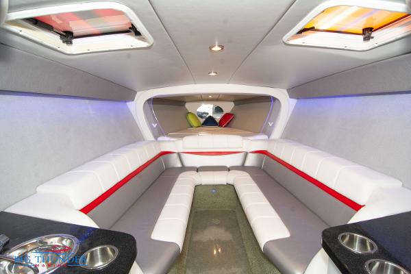 Slide: The Image of Interior of a 2012 Formula 382 FASTech boat with white and red seating. - 43