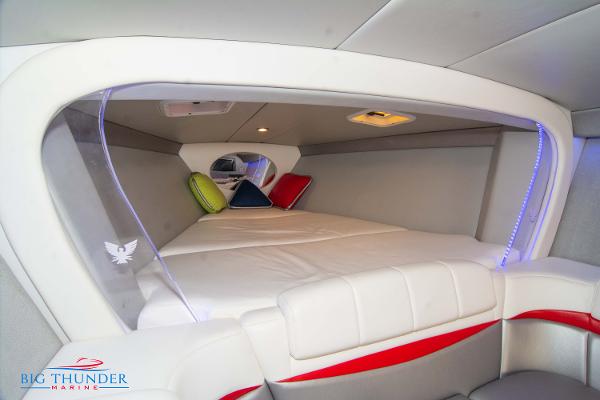 Slide: The Image of Interior cabin of a 2012 Formula 382 FASTech boat with modern design and colorful pillows. - 47