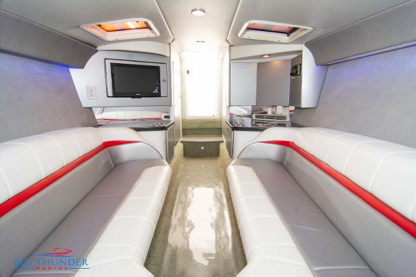 Slide: The Image of Interior of a 2012 Formula 382 FASTech boat with white and red seating. - 49