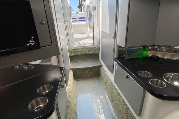 Slide: The Image of Interior of a 2013 Formula 382 FASTech boat with modern amenities and sleek design. - 15