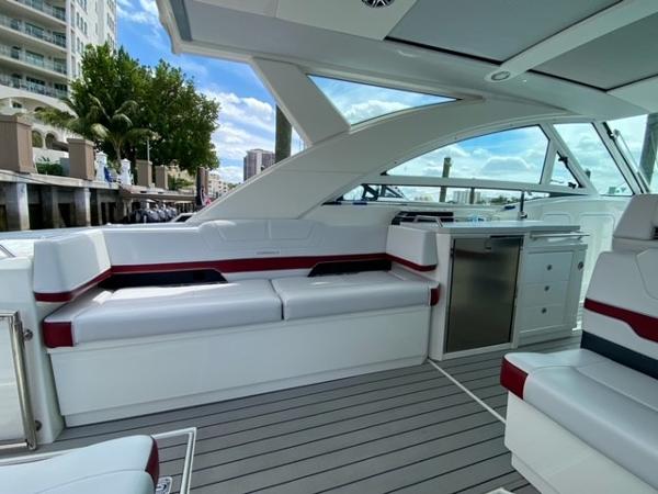Slide: The Image of 2020 Formula 430 Super Sport Crossover interior with white and red seating, modern design. - 12
