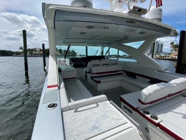 Slide: The Image of 2020 Formula 430 Super Sport Crossover luxury yacht interior with waterfront view. - 13