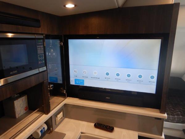 Slide: The Image of 2020 Formula 430 Super Sport Crossover interior with TV and microwave. - 20