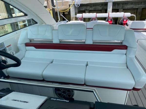 Slide: The Image of 2020 Formula 430 Super Sport Crossover interior seating area with white and red upholstery. - 7