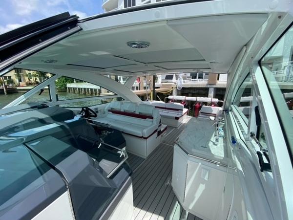 Slide: The Image of 2020 Formula 430 Super Sport Crossover luxury yacht interior with modern seating and amenities. - 8