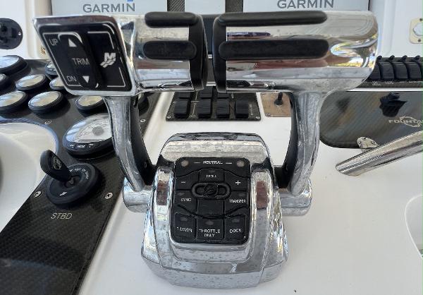 Slide: The Image of Close-up of 2008 Fountain 34 CC boat controls with Garmin navigation system. - 17