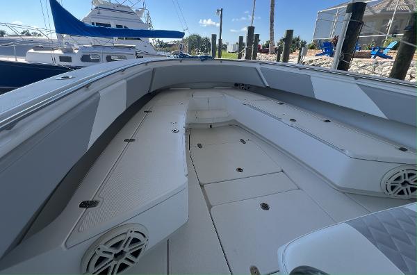 Slide: The Image of 2008 Fountain 34 CC boat interior with spacious seating and storage. - 25