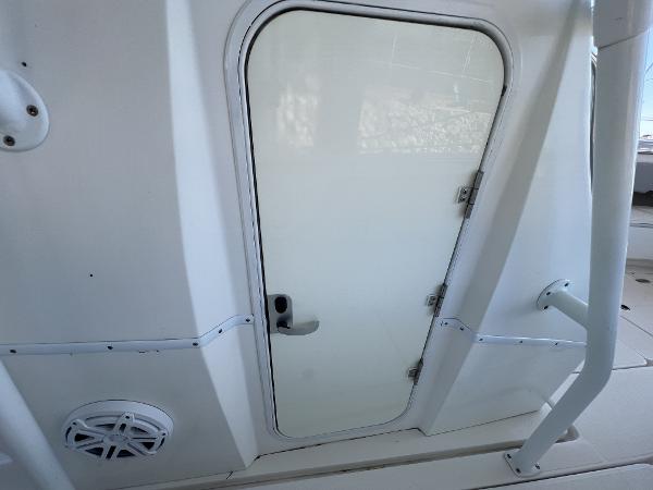Slide: The Image of White cabin door on 2008 Fountain 34 CC boat. - 27