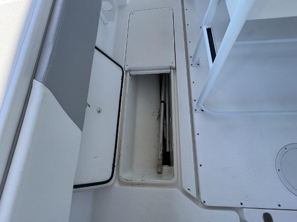 Slide: The Image of 2008 Fountain 34 CC boat interior storage compartment. - 35