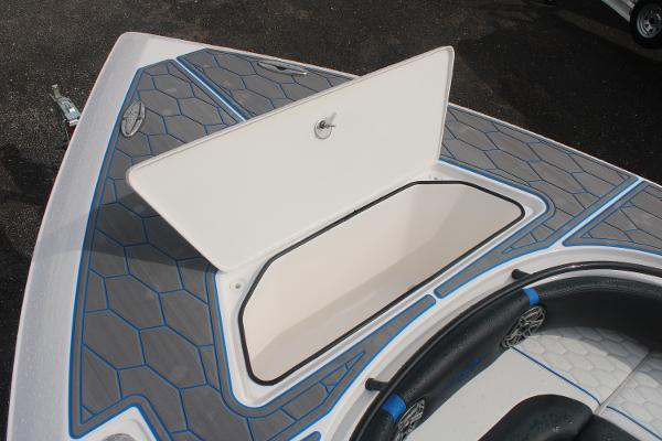 Slide: The Image of 2024 Fountain 34 SC boat storage compartment with open hatch. - 20