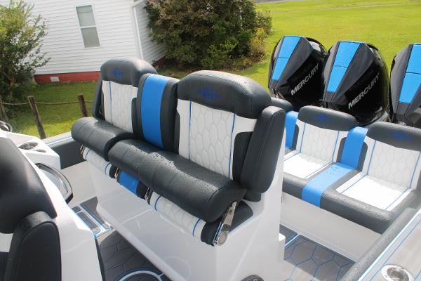 Slide: The Image of 2024 Fountain 34 SC boat seating and Mercury engines. - 25