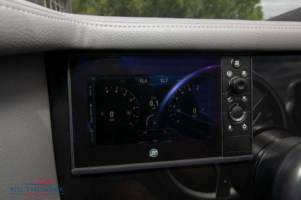 Slide: The Image of Dashboard display of a 2023 Fountain 34 Thunder Cat boat showing instrument readings. - 26