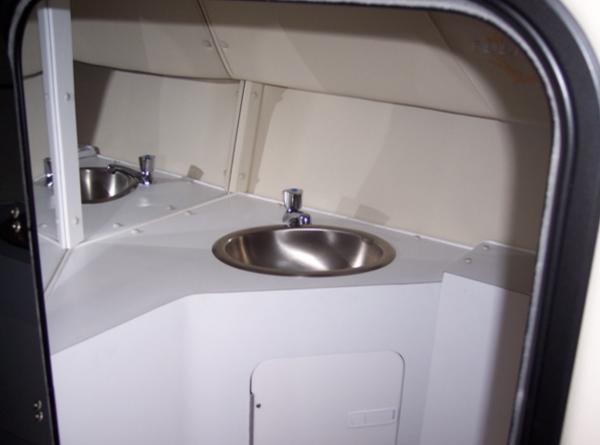 Slide: The Image of 2007 Fountain 38 Lightning boat interior sink area. - 12
