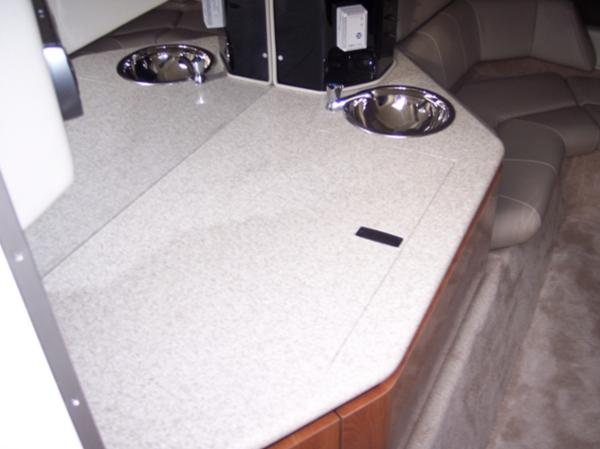 Slide: The Image of 2007 Fountain 38 Lightning boat interior with countertop and sink. - 9