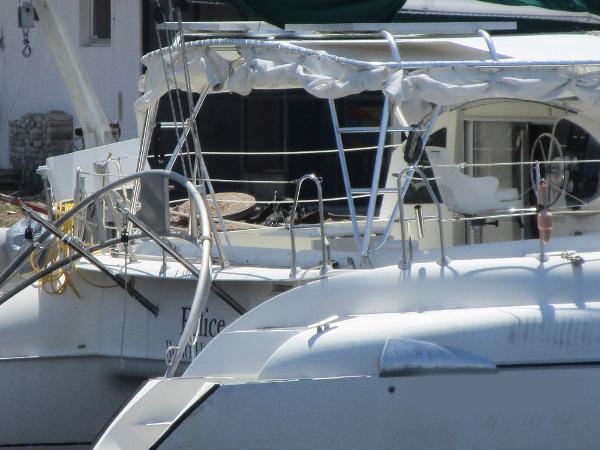 Slide: The Image of Fountaine Pajot Athena 38 catamaran, 1998 model, docked at a marina. - 25