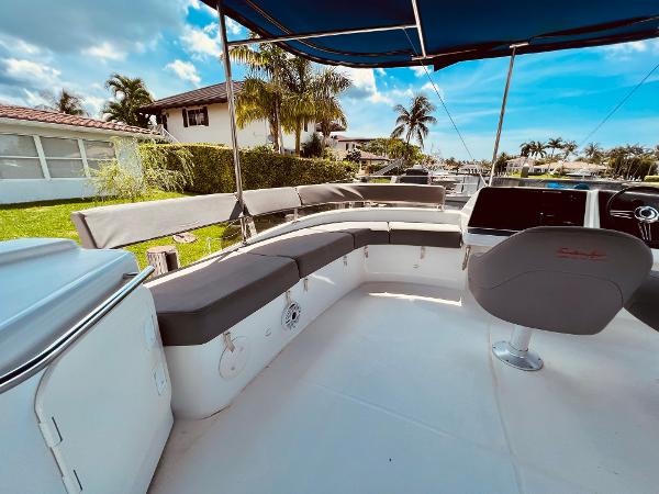 Slide: The Image of Fountaine Pajot Cumberland 47 LC 2015 yacht deck with seating, under blue sky. - 17