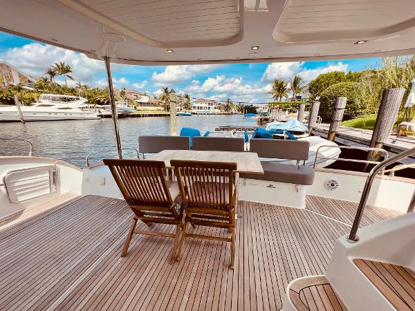 Slide: The Image of Spacious deck of 2015 Fountaine Pajot Cumberland 47 LC yacht with waterfront view. - 23
