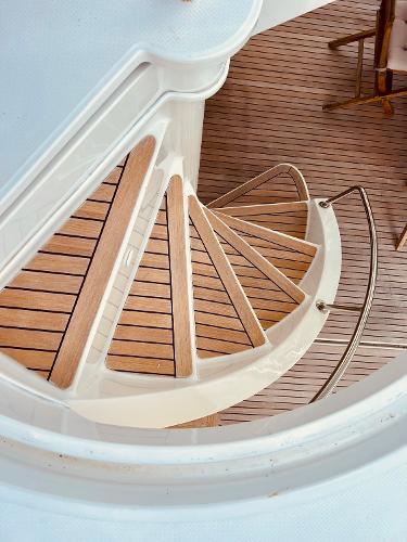 Slide: The Image of Wooden spiral staircase on 2015 Fountaine Pajot Cumberland 47 LC yacht. - 26