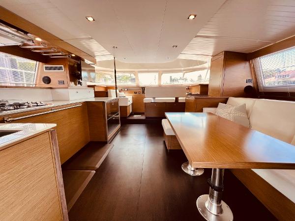 Slide: The Image of Spacious interior of 2015 Fountaine Pajot Cumberland 47 LC yacht with modern kitchen and dining area. - 27