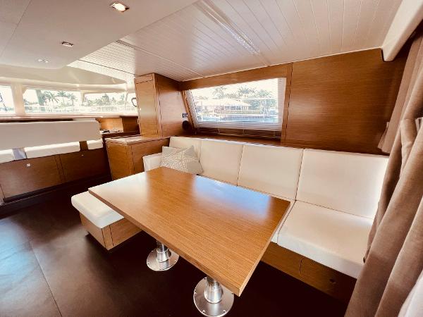 Slide: The Image of Interior of 2015 Fountaine Pajot Cumberland 47 LC with modern dining area. - 32