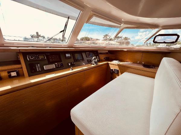 Slide: The Image of Interior helm of 2015 Fountaine Pajot Cumberland 47 LC yacht, featuring modern navigation equipment. - 34