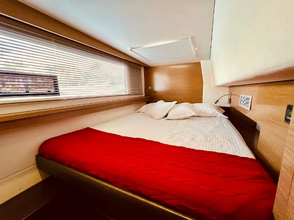 Slide: The Image of Cozy bedroom in 2015 Fountaine Pajot Cumberland 47 LC yacht with red bedding. - 38
