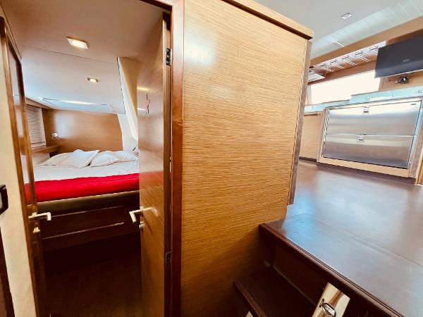 Slide: The Image of Interior of 2015 Fountaine Pajot Cumberland 47 LC, featuring cozy cabin and modern kitchen. - 41