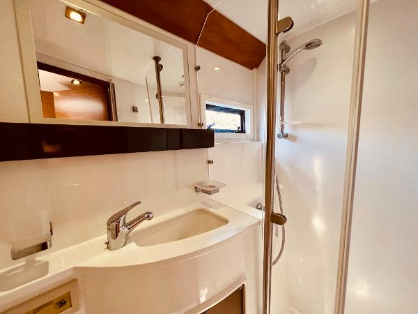 Slide: The Image of Luxurious bathroom in 2015 Fountaine Pajot Cumberland 47 LC yacht, featuring modern fixtures. - 44