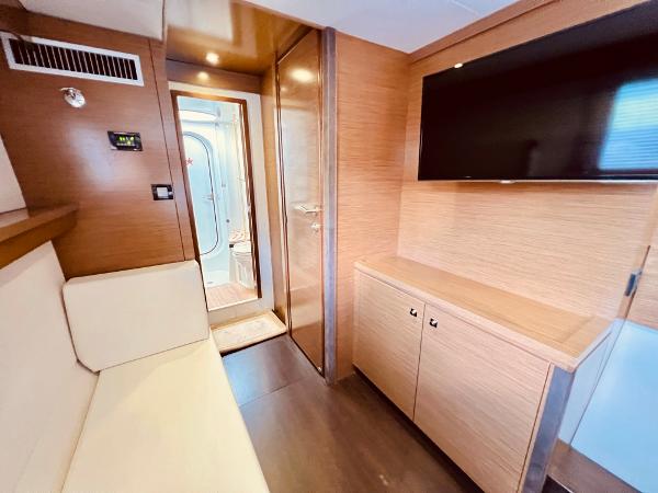Slide: The Image of Interior of 2015 Fountaine Pajot Cumberland 47 LC yacht with modern wood finish and TV. - 49