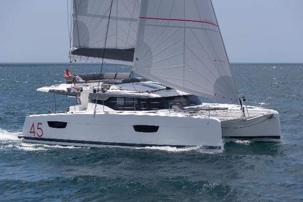 Slide: The Image of 2024 Fountaine Pajot Elba 45 catamaran sailing on the ocean. - 2