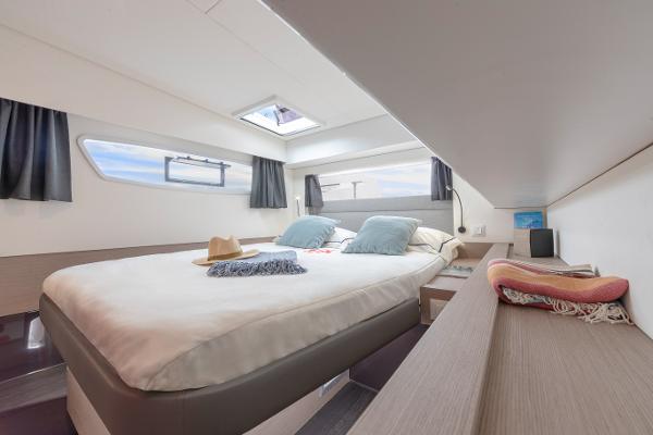 Slide: The Image of Luxurious bedroom interior of 2024 Fountaine Pajot Elba 45 catamaran with skylight and modern decor. - 8