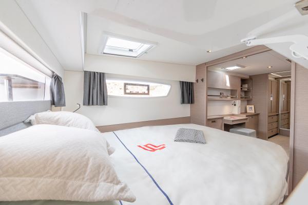 Slide: The Image of Luxurious bedroom interior of 2024 Fountaine Pajot Elba 45 catamaran. - 9