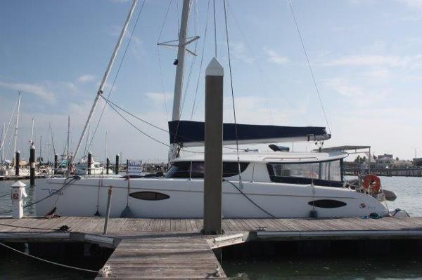 Slide: The Image of 2008 Fountaine Pajot Orana 44 catamaran docked at marina. - 0