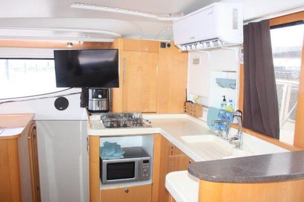 Slide: The Image of Modern kitchen interior of 2008 Fountaine Pajot Orana 44 catamaran with appliances. - 23