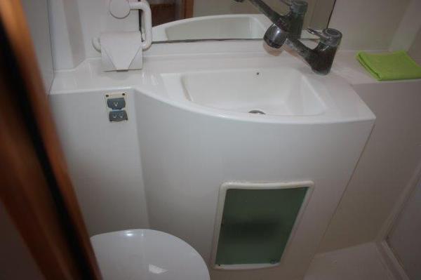 Slide: The Image of Compact bathroom sink area in 2008 Fountaine Pajot Orana 44 catamaran. - 36