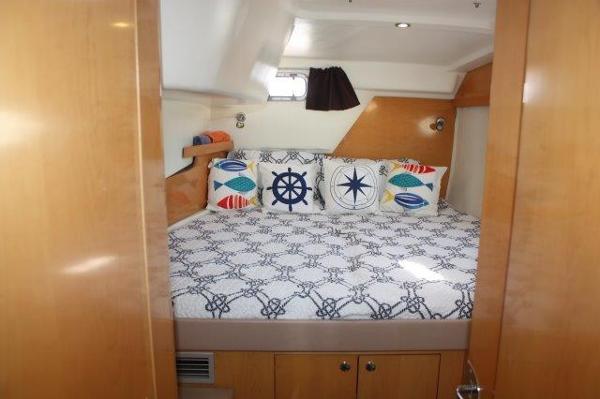 Slide: The Image of Cozy bedroom in 2008 Fountaine Pajot Orana 44 catamaran with nautical-themed decor. - 48