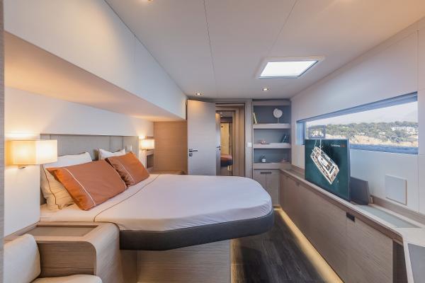 Slide: The Image of Luxurious bedroom interior of 2024 Fountaine Pajot Samana 59 yacht with scenic window view. - 11
