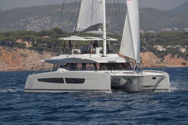 Slide: The Image of 2024 Fountaine Pajot Samana 59 sailing catamaran on the water. - 2