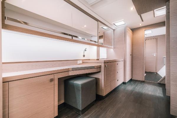 Slide: The Image of Modern interior of 2024 Fountaine Pajot Tanna 47 yacht with sleek cabinetry and seating. - 6