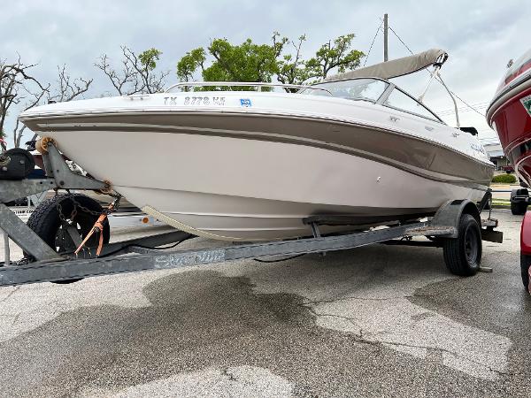 Slide: The Image of 2003 Four Winns 190 Horizon boat on a trailer. - 1