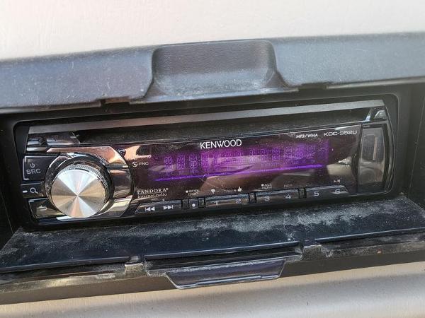 Slide: The Image of Kenwood stereo system in a 1998 Four Winns 200 Horizon boat dashboard. - 13