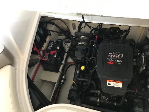 Slide: The Image of 2004 Four Winns 234 Funship engine compartment with MerCruiser 350 MAG MPI. - 16