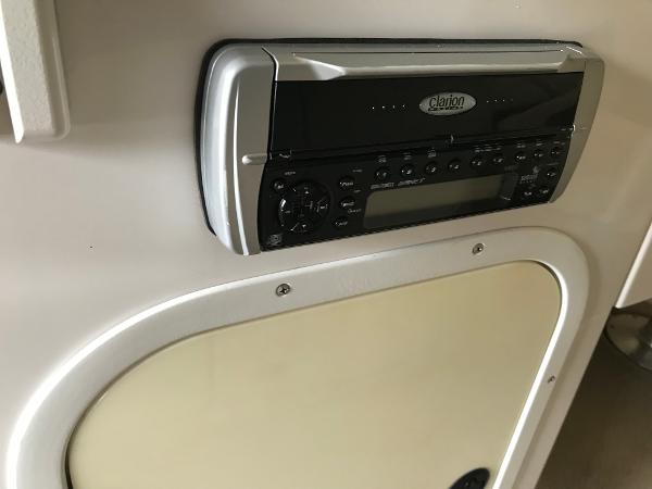 Slide: The Image of Clarion stereo system in 2004 Four Winns 234 Funship boat interior. - 34