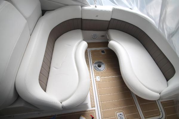 Slide: The Image of 2004 Four Winns 268 Vista boat interior with white and brown seating. - 12