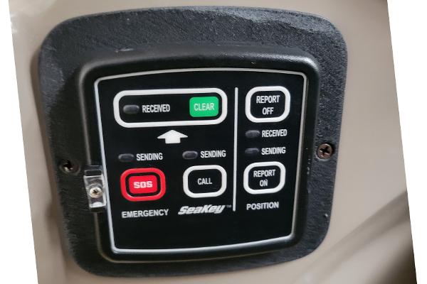 Slide: The Image of Control panel of a 2004 Four Winns 268 Vista boat with emergency and communication buttons. - 20