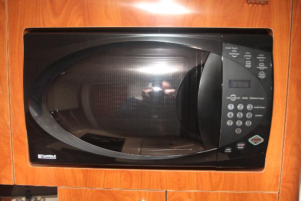 Slide: The Image of Built-in microwave in 2004 Four Winns 268 Vista boat kitchen. - 31