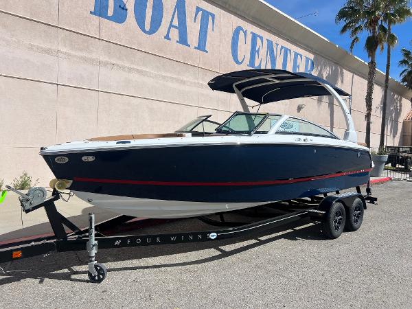 Slide: The Image of 2023 Four Winns H4 boat on trailer at Boat Center. - 0