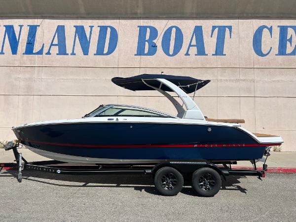 Slide: The Image of 2023 Four Winns H4 boat on a trailer at Inland Boat Center. - 1