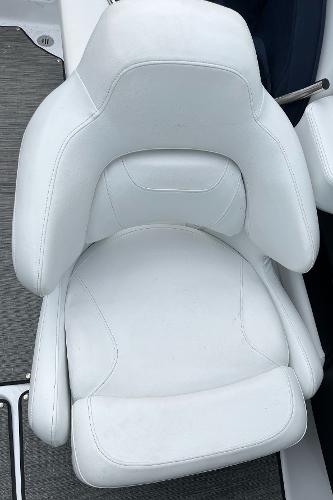 Slide: The Image of White leather seat on 2022 Four Winns H4 OB boat. - 14