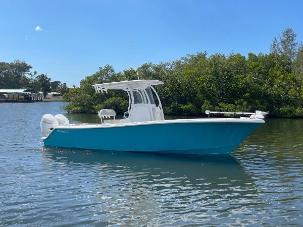Slide: The Image of 2024 Front Runner 26 Center Console boat on calm water. - 1